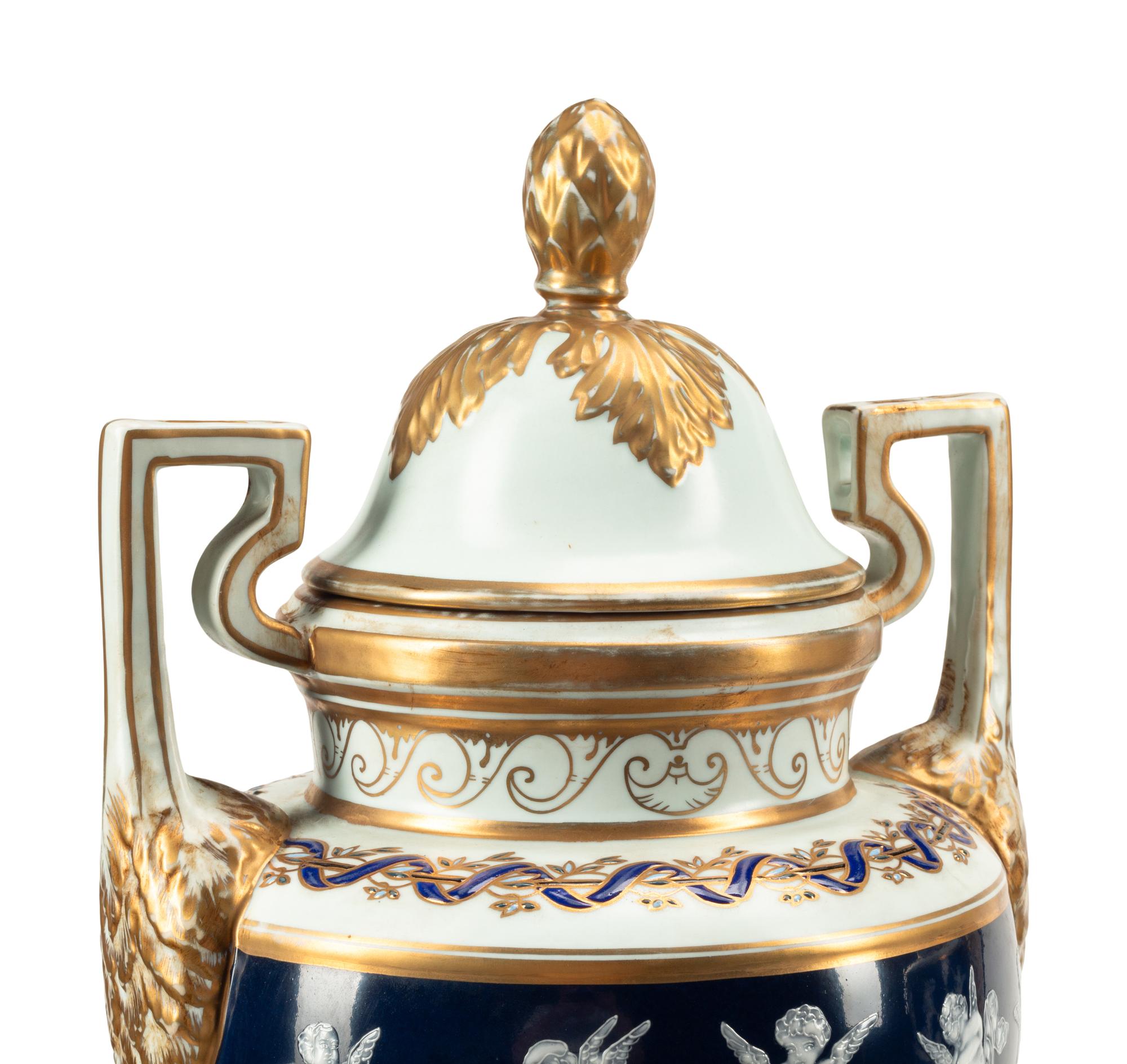 A Pair of Minton Style Pâte-sur-Pâte Porcelain Urns