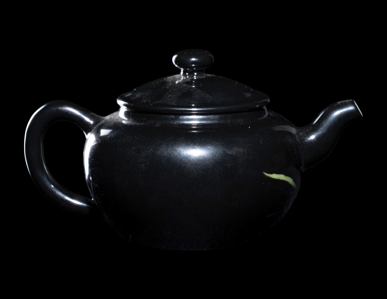 A Chinese Black Ground Famille Rose Porcelain Covered Teapot
