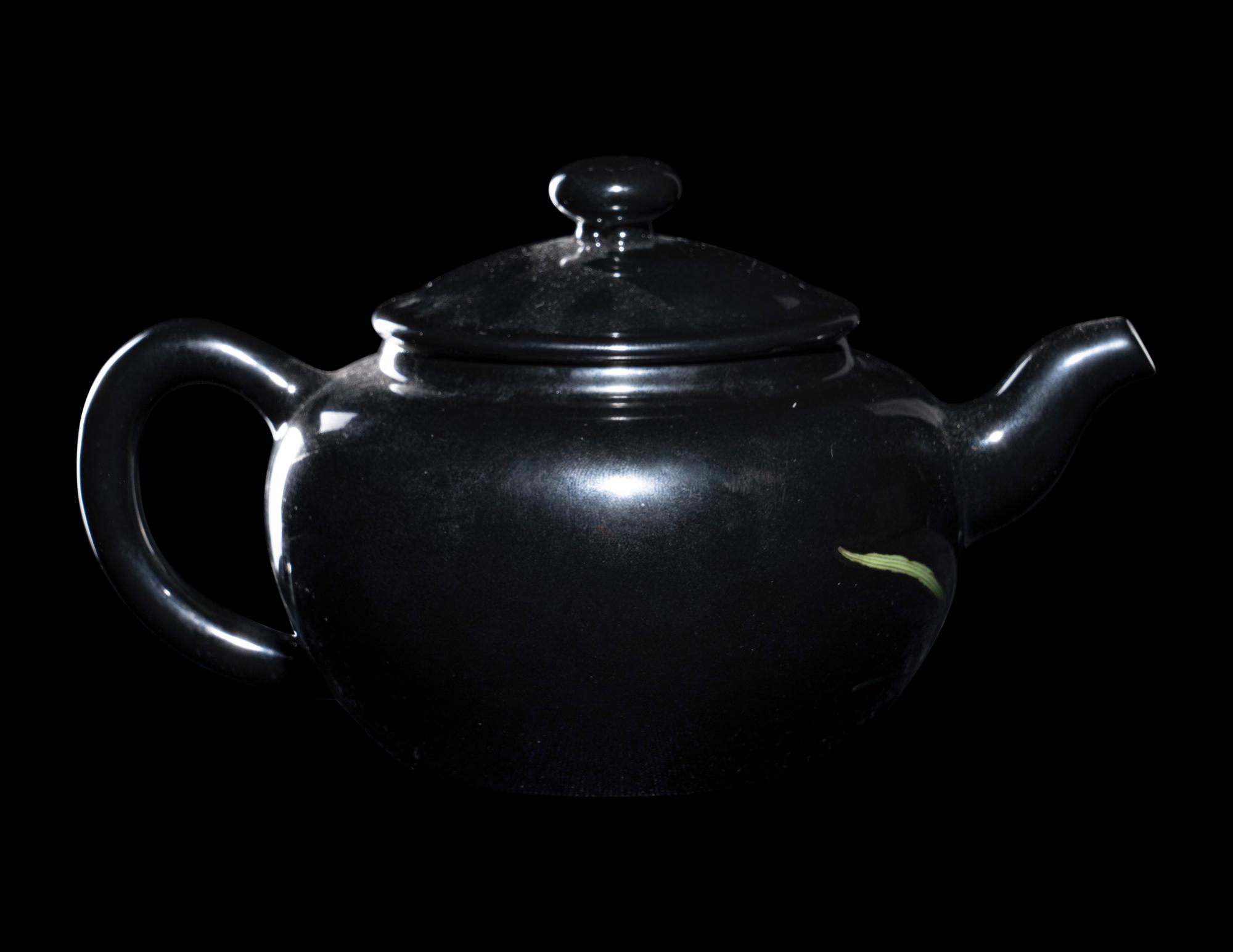 A Chinese Black Ground Famille Rose Porcelain Covered Teapot