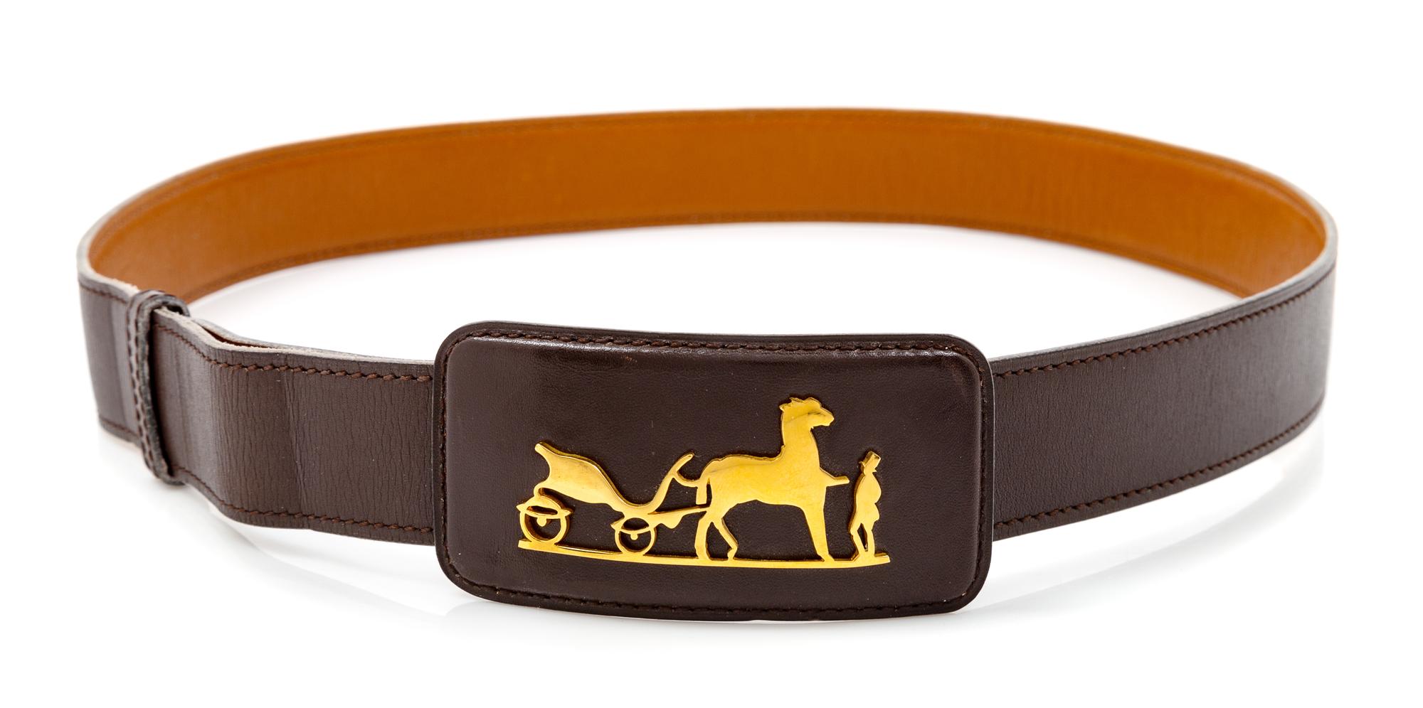 An Hermès Vintage Brown Leather Belt, 37" L (longest) x 1.25" W.
