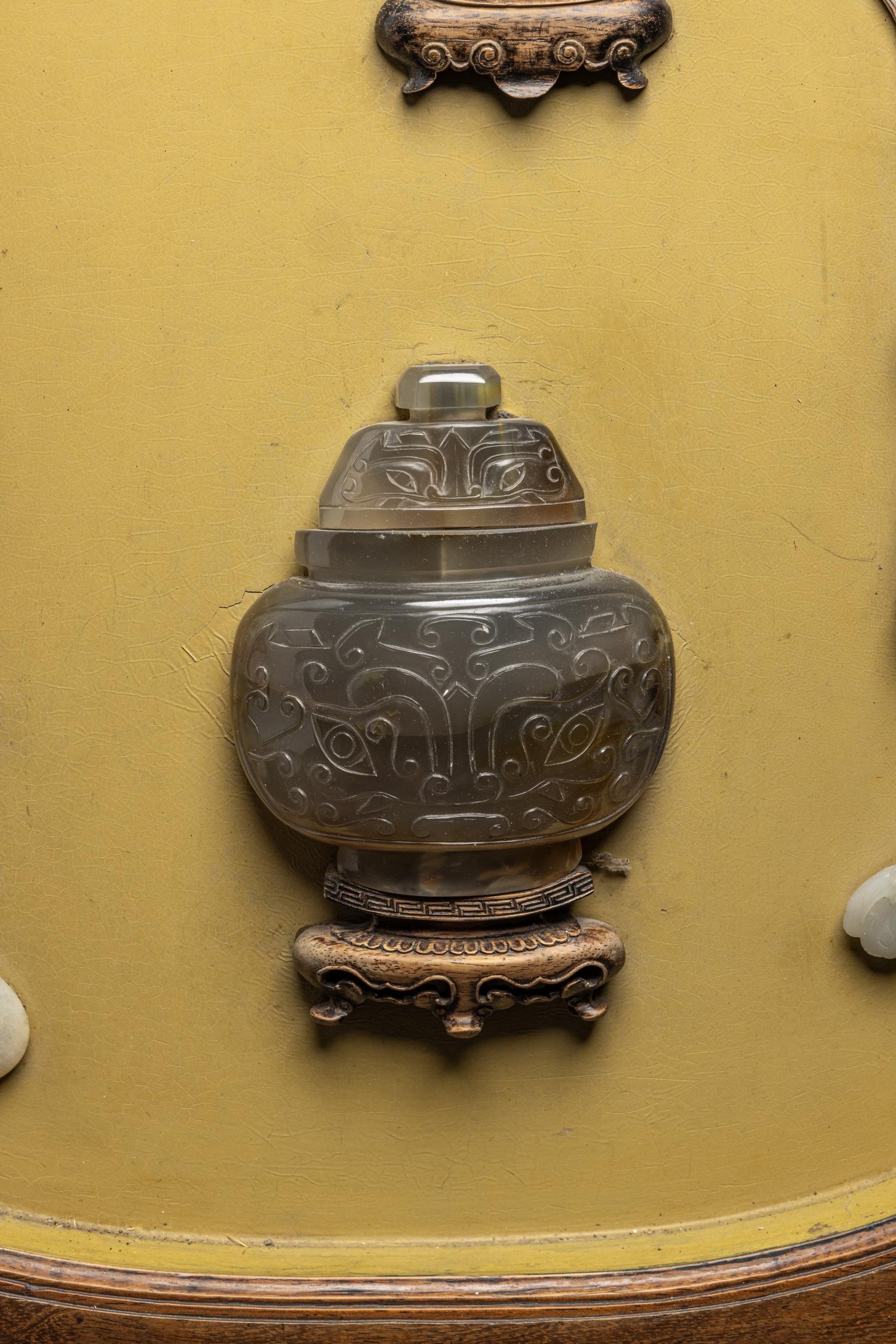 A Pair of Chinese Jade and Hardstone Embellished Yellow Lacquered Wood Gourd-Form Panels 黃漆地嵌寳博古圖葫蘆形挂屏一對