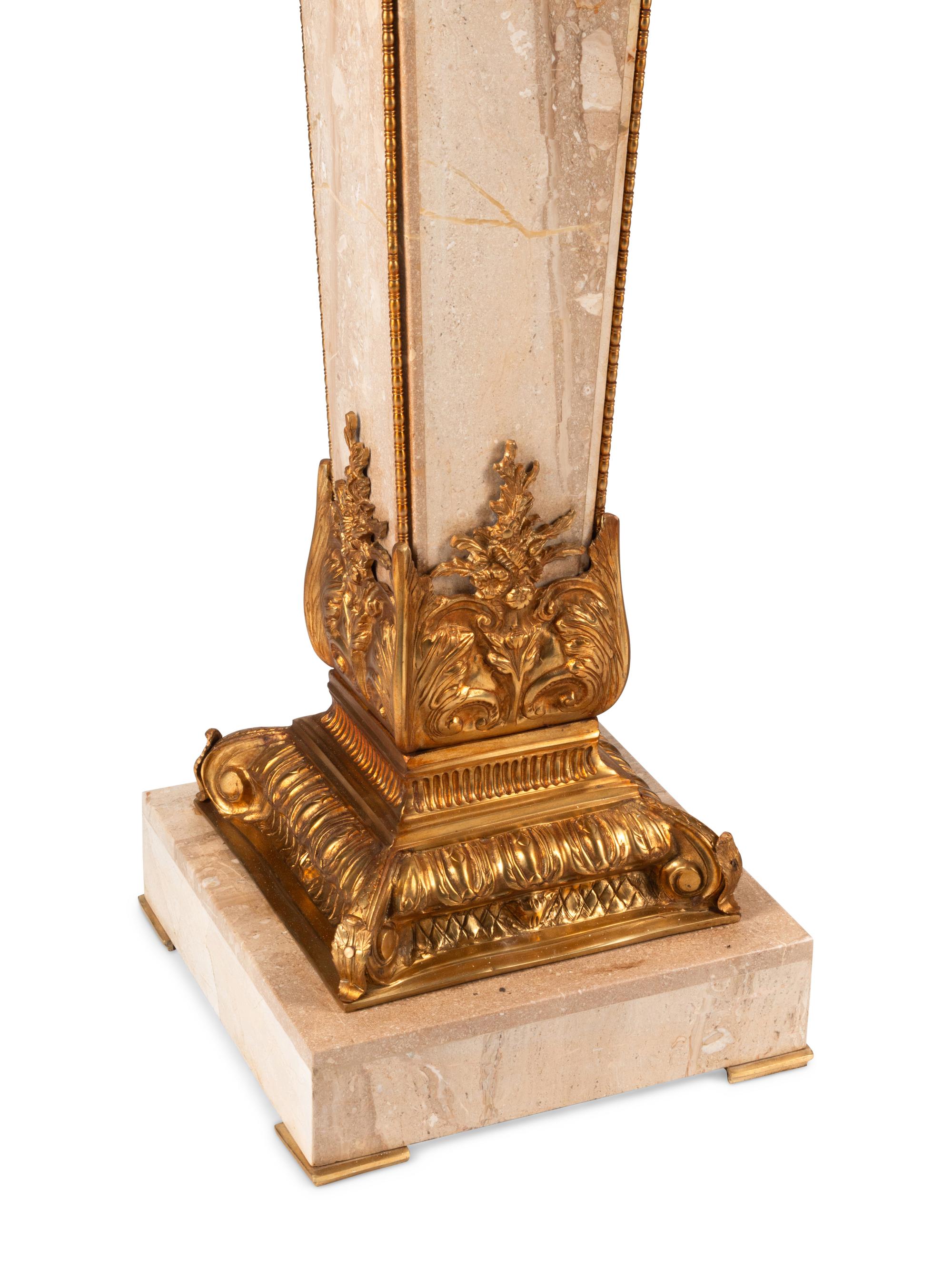 A Pair of Louis XVI Style Gilt Bronze Mounted Marble Pedestals