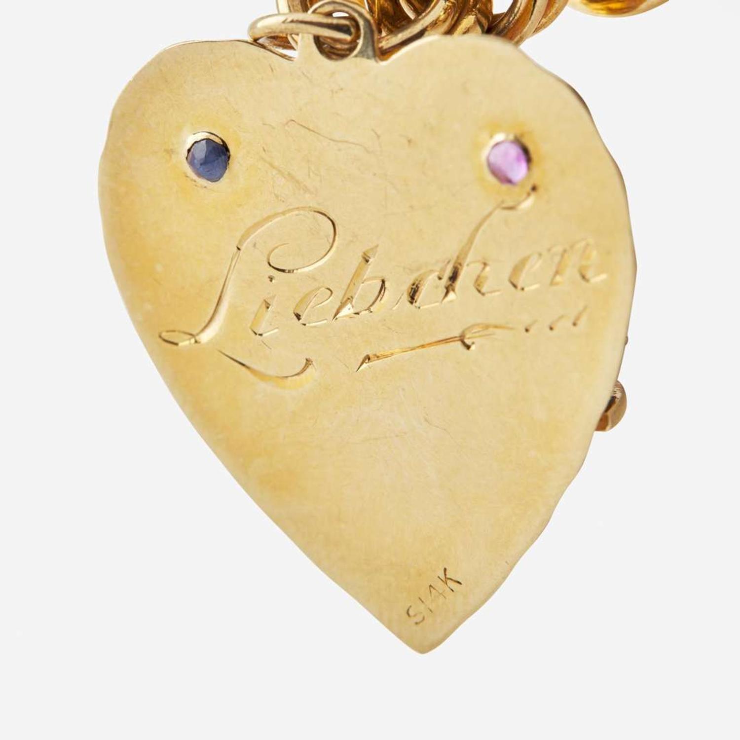 A 14K Yellow Gold Charm Bracelet with 14K Yellow Gold and Gemstone Charms