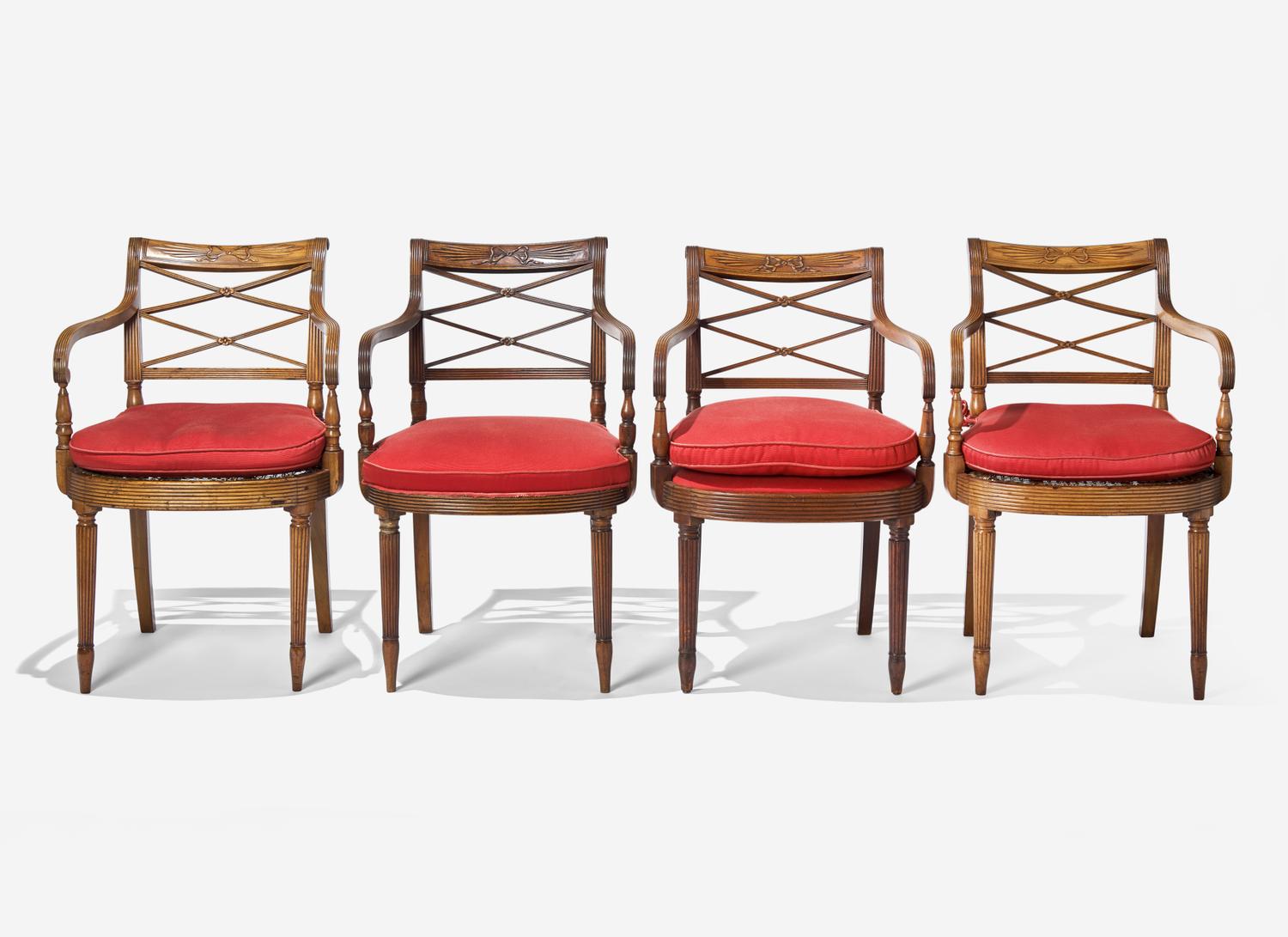 A Pair and Two Similar Federal Carved Mahogany Armchairs