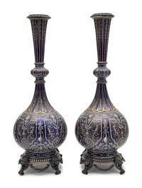 A Pair of Continental Gilt and Enameled Cobalt Glazed Porcelain Vases