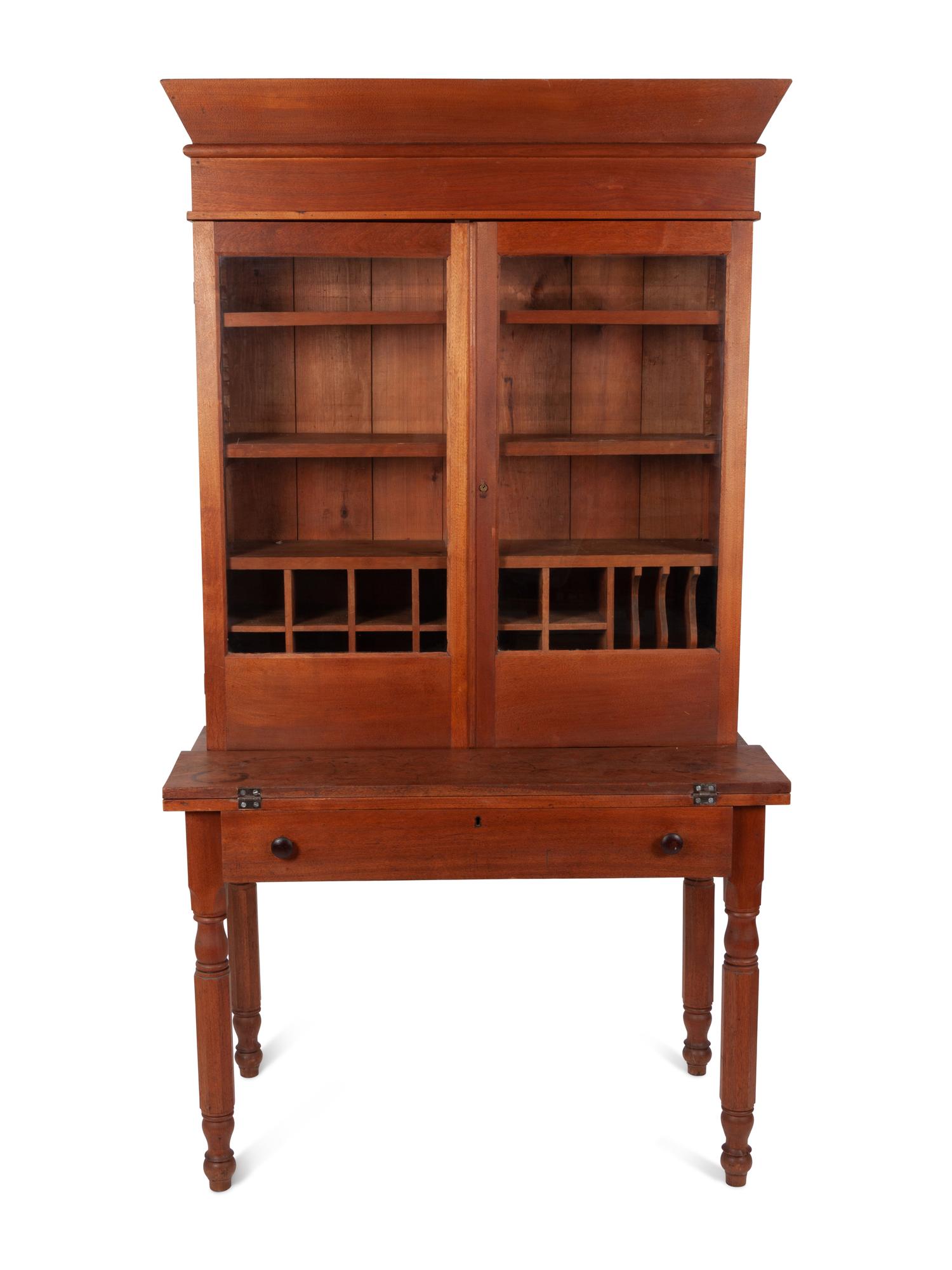 A Late Federal Cherrywood Desk and Bookcase