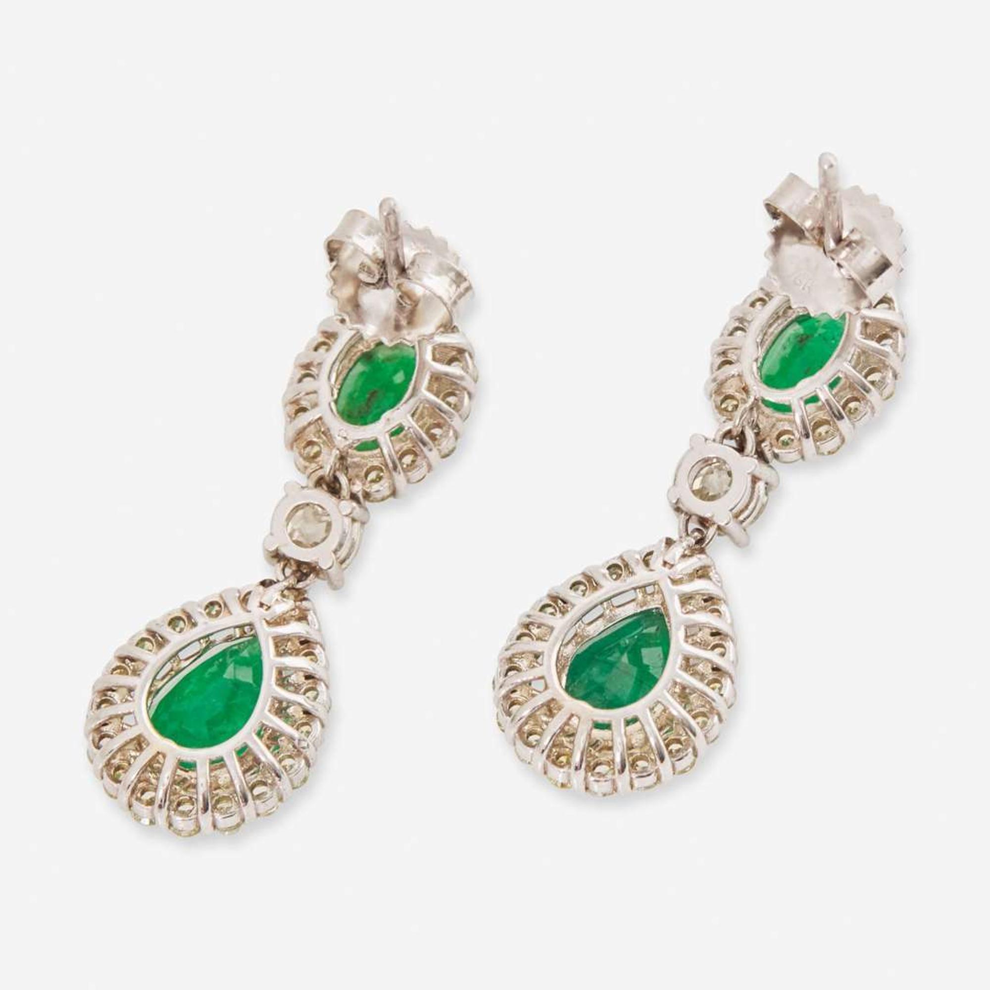 A Pair of 18K White Gold, Diamond, and Emerald Earrings