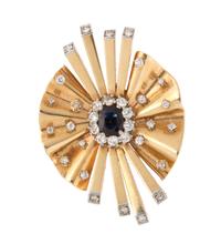 A Platinum Topped Gold, Sapphire and Diamond "Reflection" Brooch, Trabert & Hoeffer-Mauboussin, 20.90 dwts.