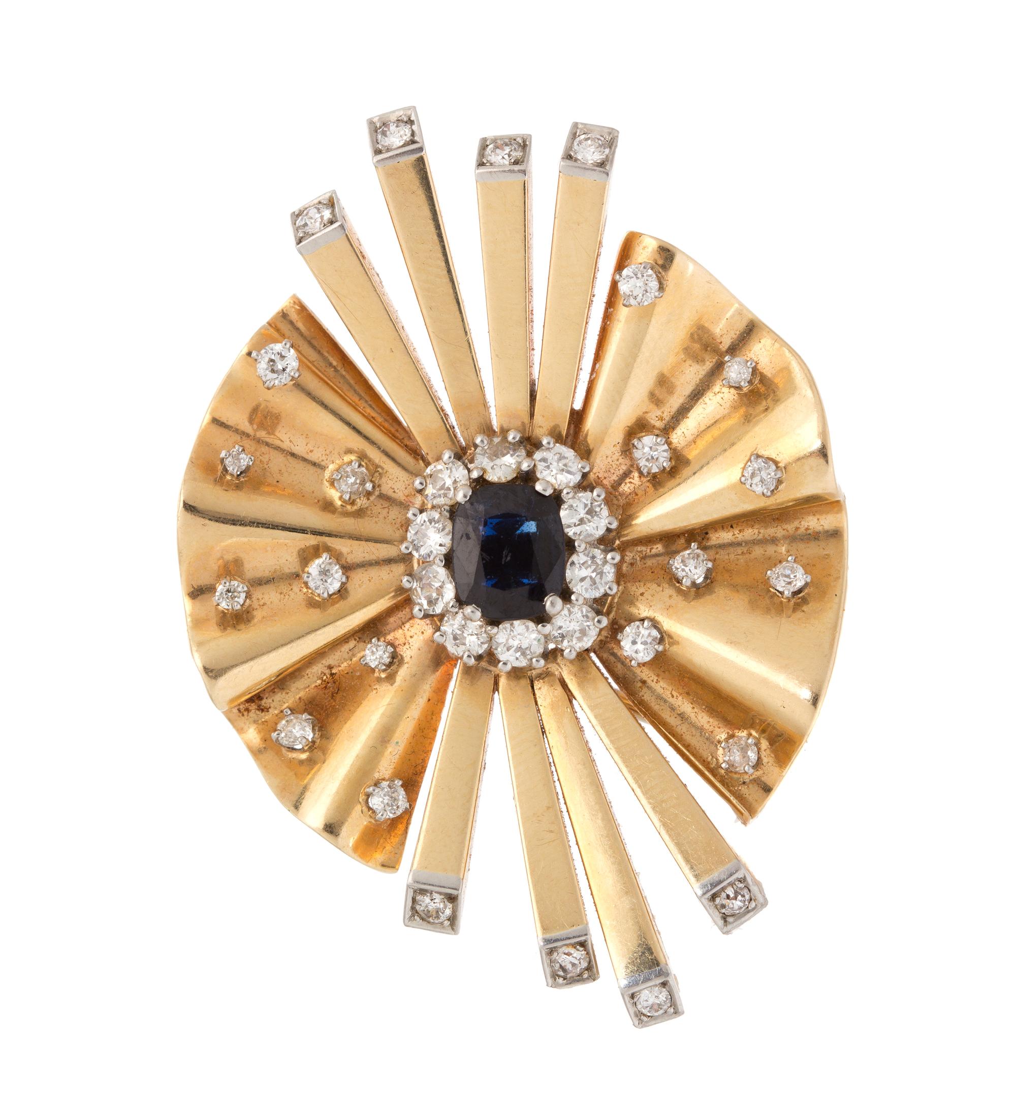 A Platinum Topped Gold, Sapphire and Diamond "Reflection" Brooch, Trabert & Hoeffer-Mauboussin, 20.90 dwts.
