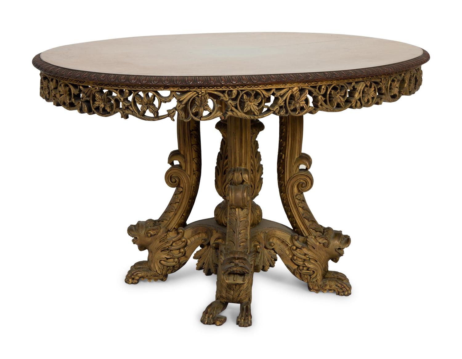 An Anglo-Indian Carved and Parcel Gilt Tilt-Top Table with Lion Form Feet