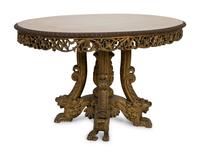 An Anglo-Indian Carved and Parcel Gilt Tilt-Top Table with Lion Form Feet
