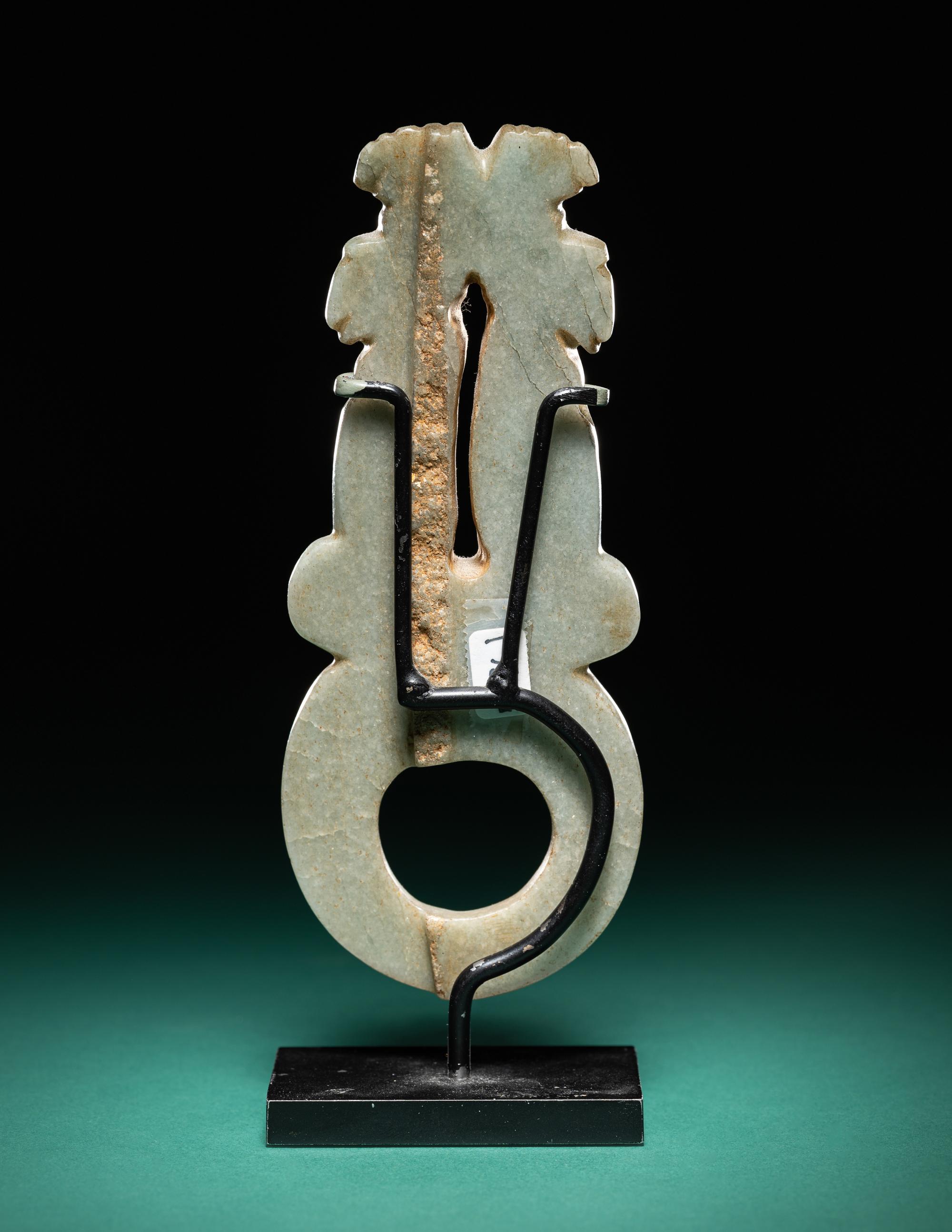 A Costa Rican Green Jade Double Avian Pendant