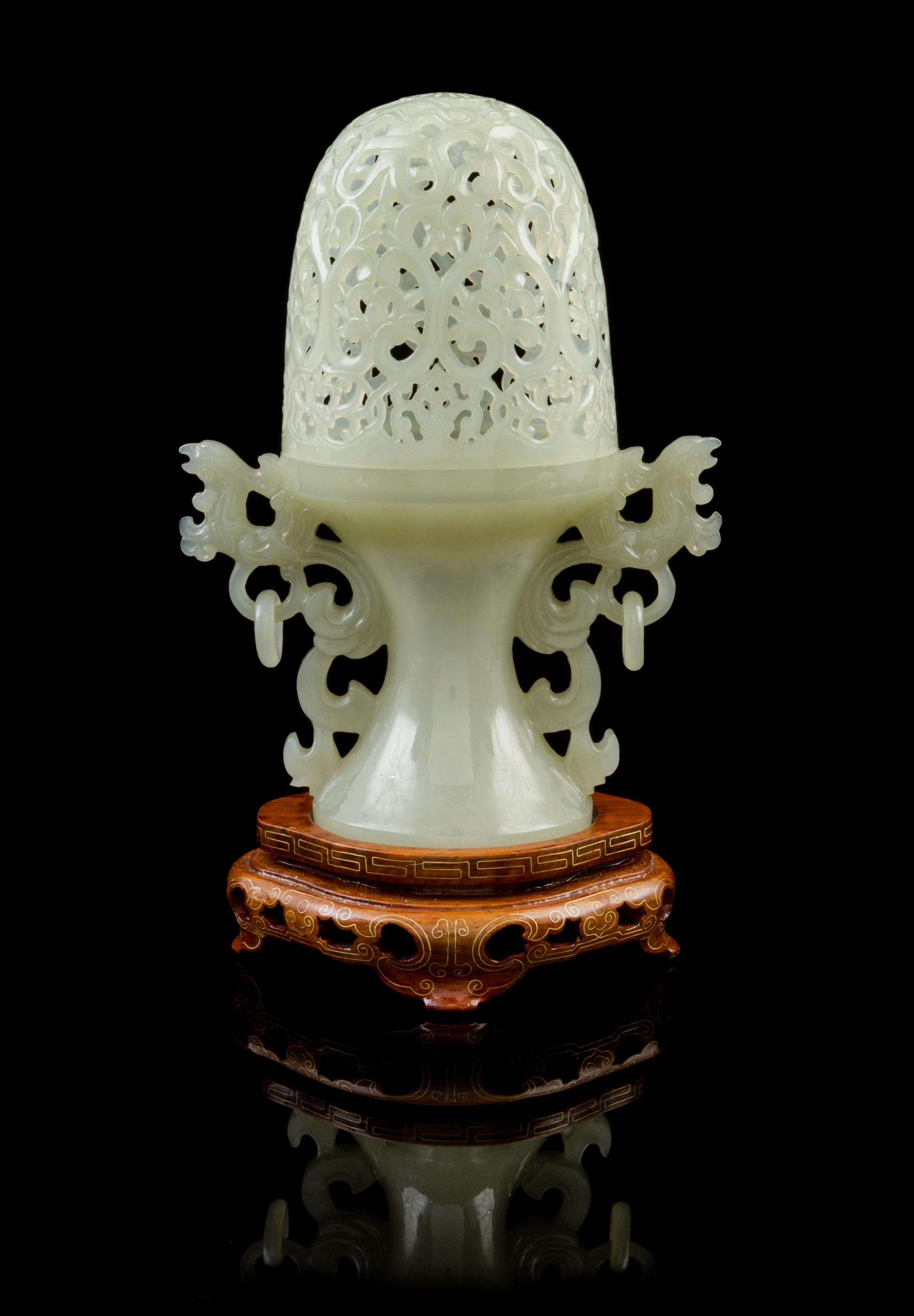 A Chinese Pierce Carved Jade Lamp 20TH CENTURY Height of jade 6 1/2 inches. — 20TH CENTURY
