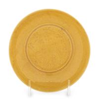 An Incised Yellow Glazed Porcelain 'Cranes and Pines' Plate