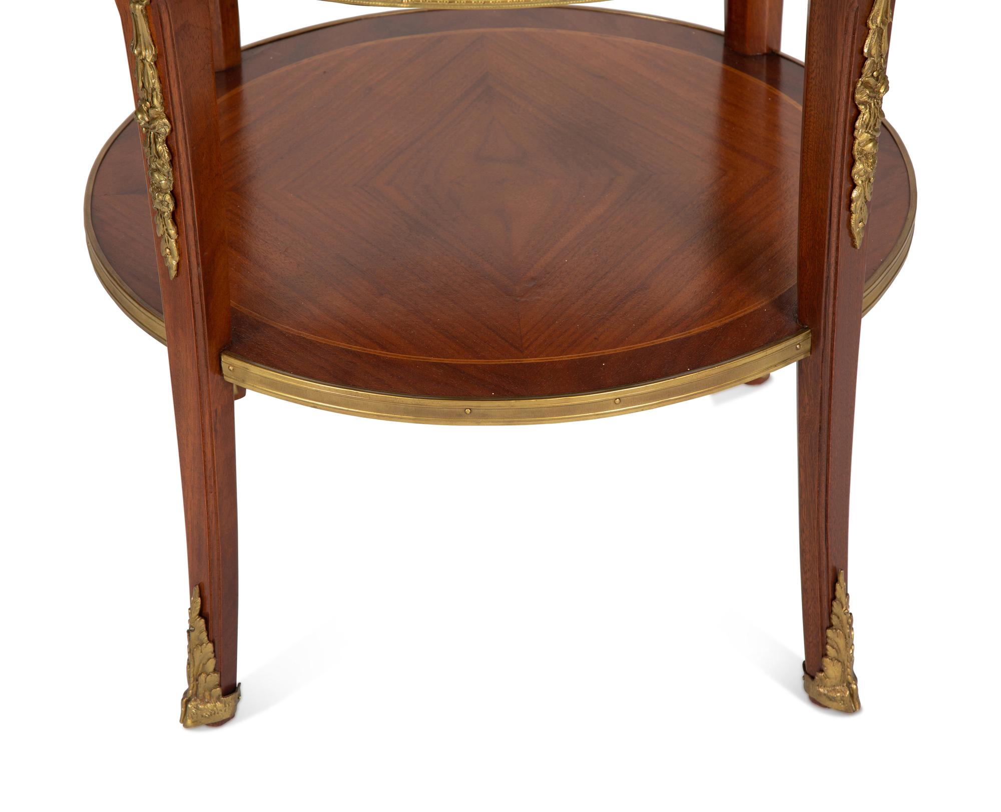 A Pair of Louis Philippe Style Gilt-Bronze Mounted Mahogany Side Tables with Inset Marble Top.