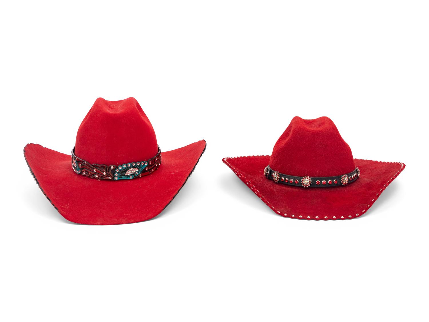 Two Red Western Hats and Hat Case