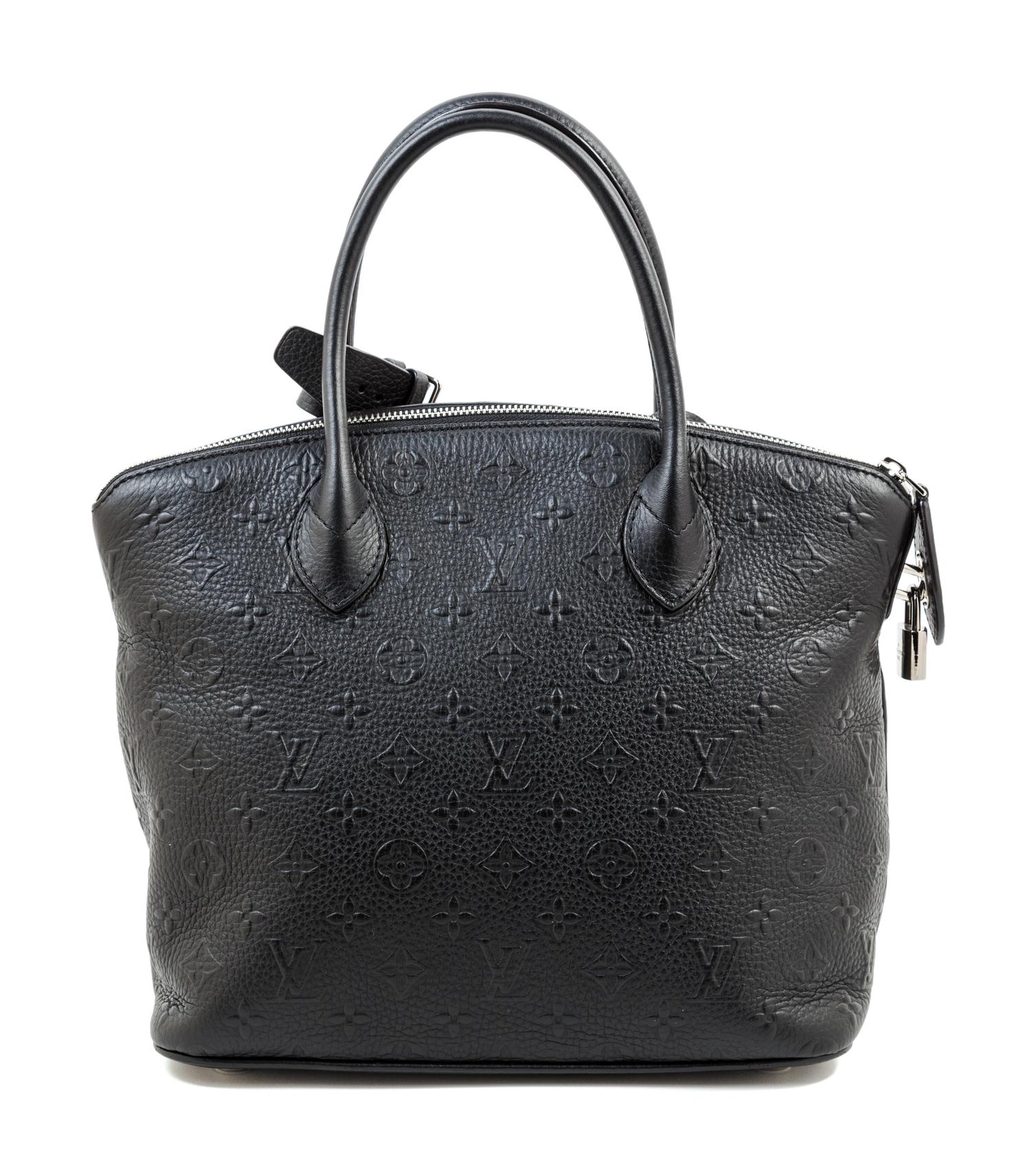 A Louis Vuitton Black Empreinte Montaigne Handbag, 11" x 10.5" x 6"; Handle drop: 4.5".