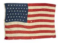 [Spanish-American War]. Photographs and an American flag collected by Spanish American War Veteran Hiram Hampton.