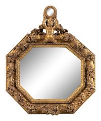 An Italian Baroque Style Giltwood Mirror