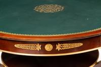 An Empire Style Gilt Bronze Mounted Mahogany Leather-Top Center Table
