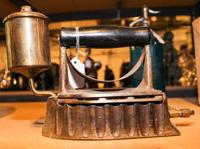 A Monitor Iron Height 10 1/2 inches. — EARLY 20TH CENTURY