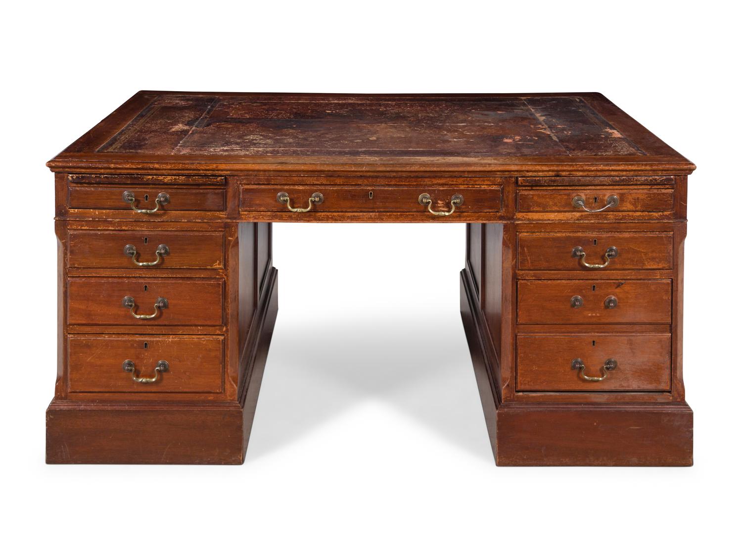 An Edwardian Tooled Leather-Inset Mahogany Partners' Desk