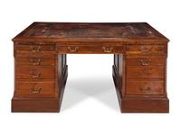 An Edwardian Tooled Leather-Inset Mahogany Partners' Desk