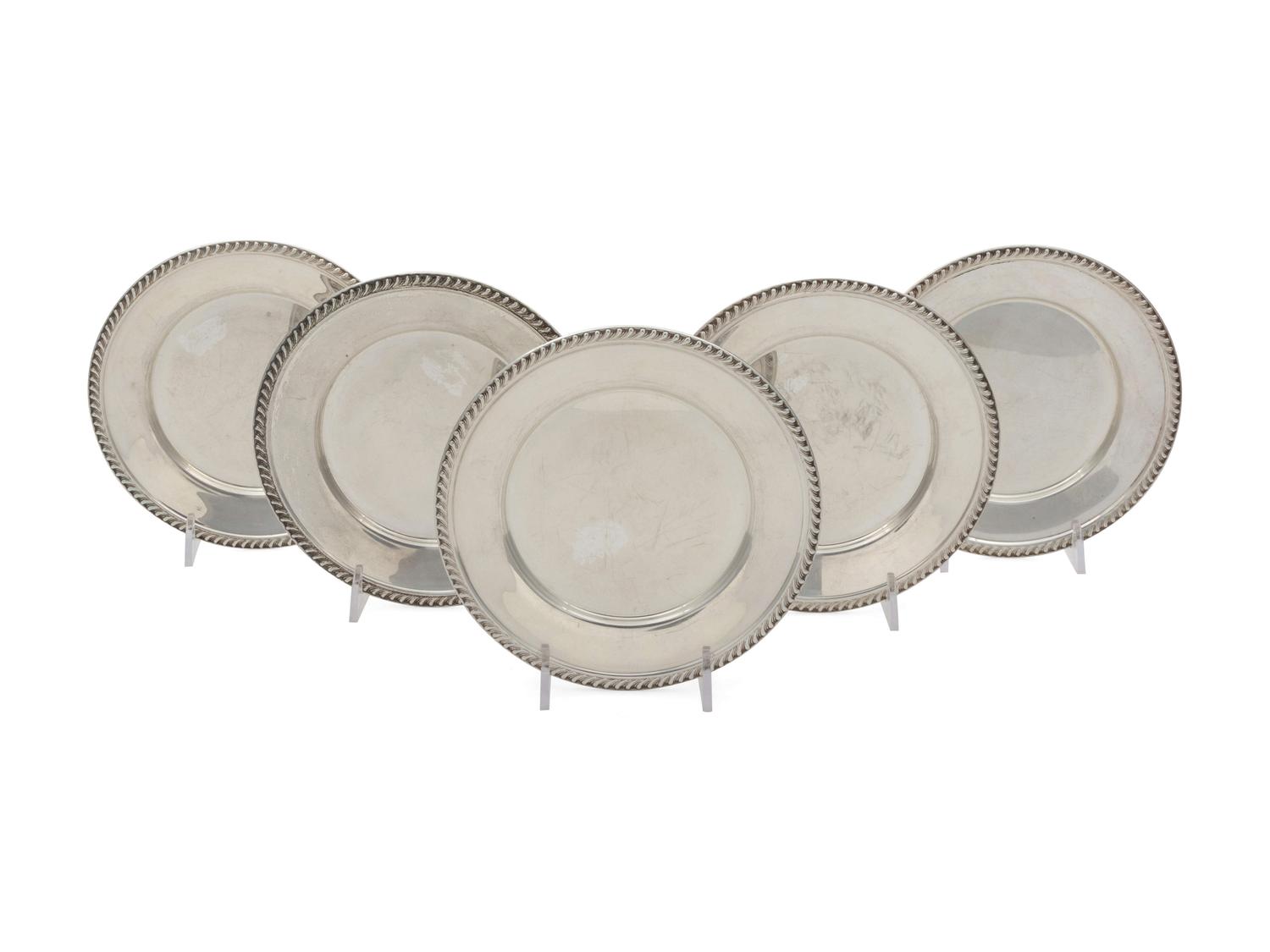 A Set of Five American Silver Butter Pats