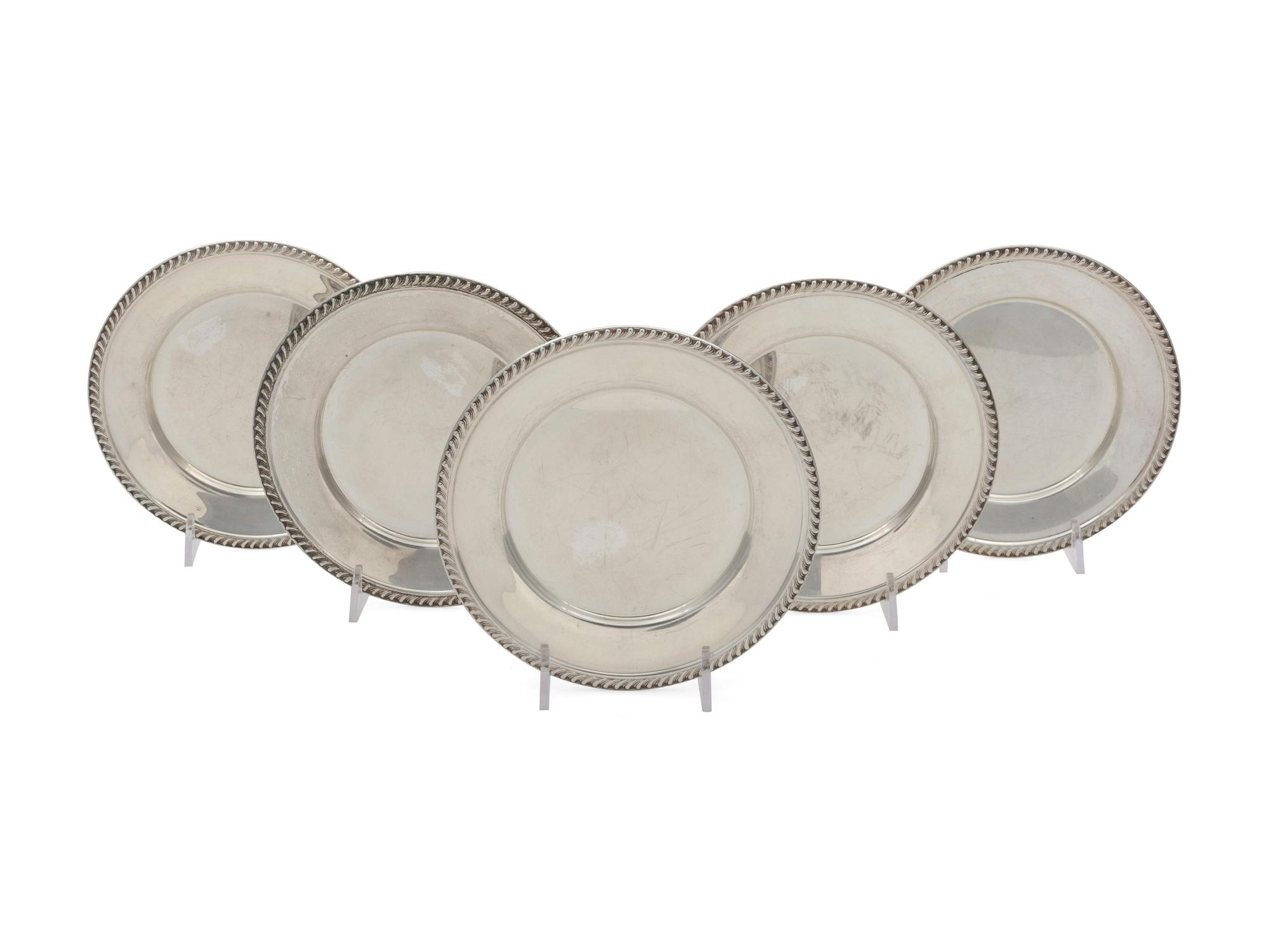 A Set of Five American Silver Butter Pats