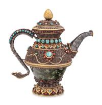 A Tibetan or Himalayan Hardstone Mounted Silver Teapot