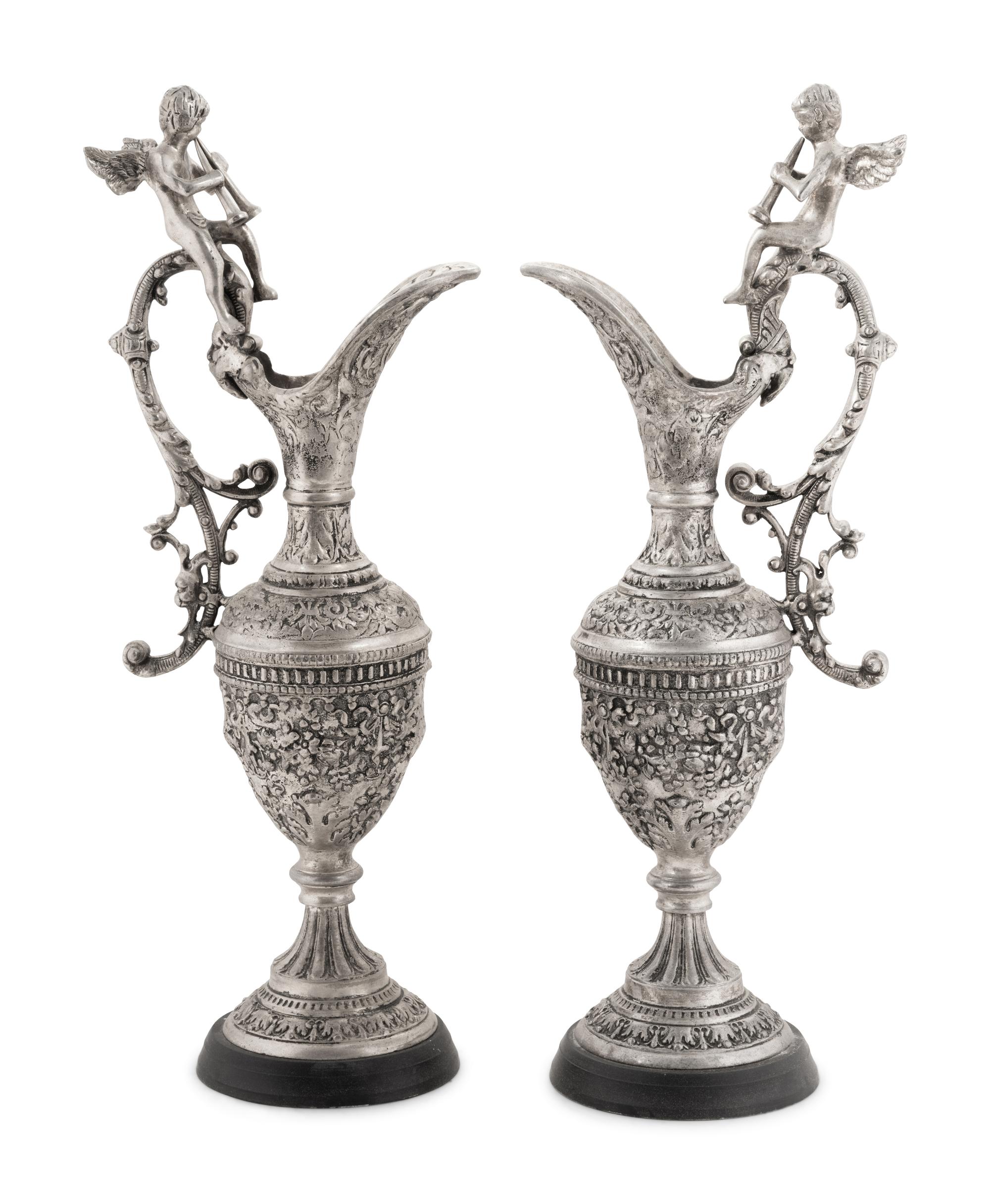 A Pair of Neoclassical Style White Metal Ewers