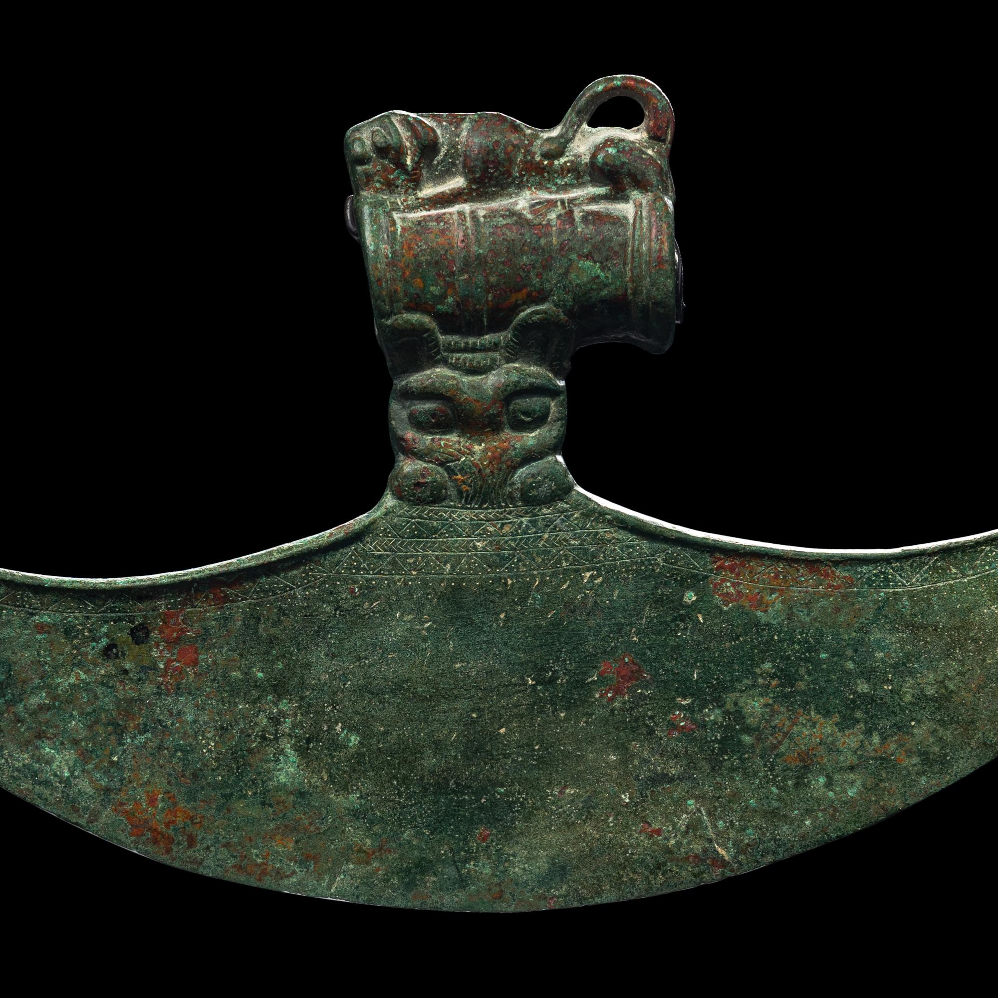A Luristan Bronze Axe Head