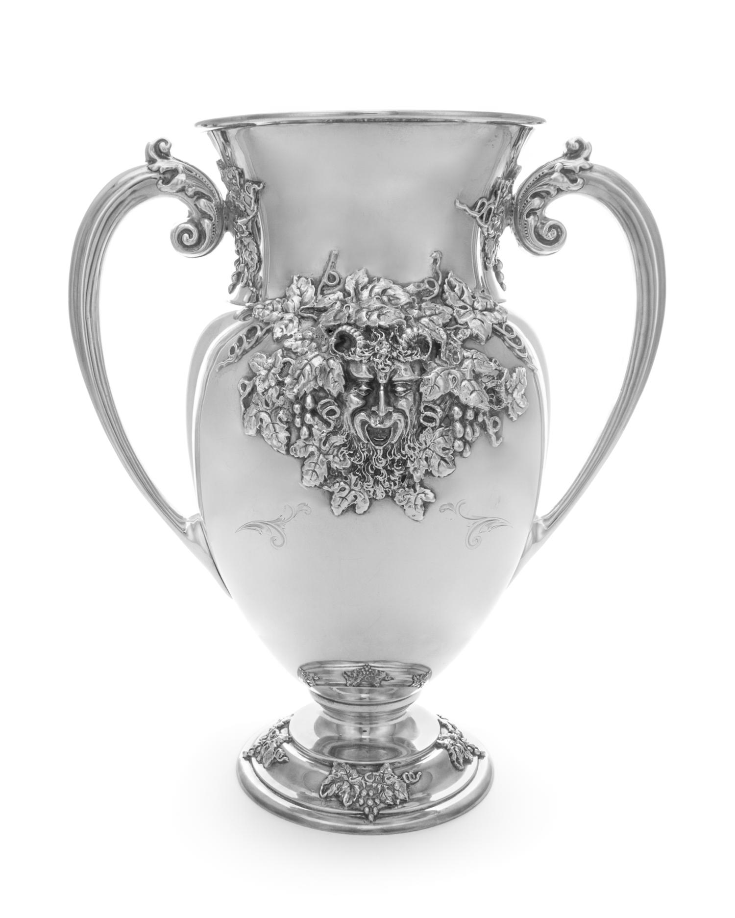 An American Silver Two-Handled Vase, Redlich & Co., New York, NY, of baluster form, the body centered with a satyr mask among grape bun