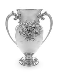 An American Silver Two-Handled Vase, Redlich & Co., New York, NY, of baluster form, the body centered with a satyr mask among grape bun