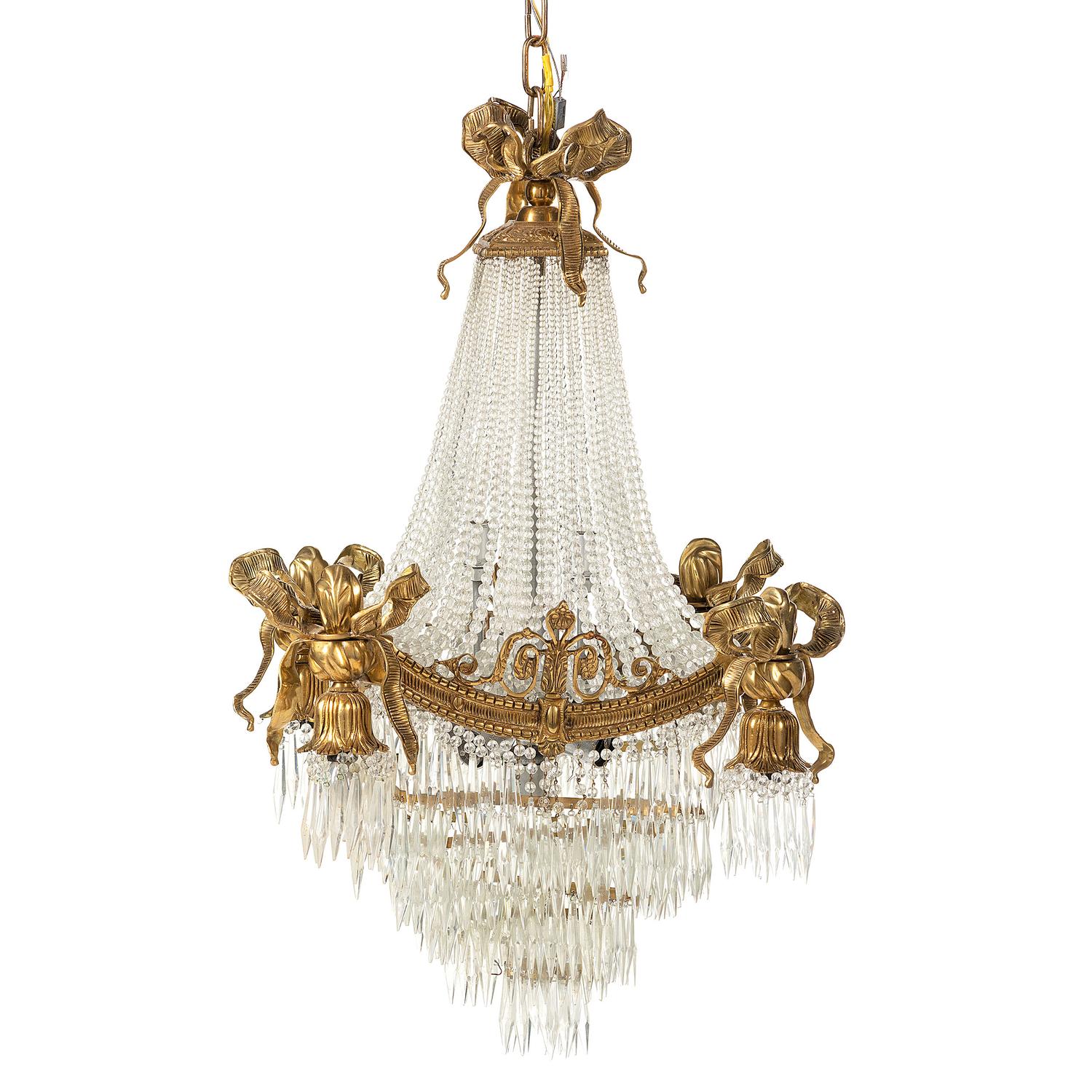 A Louis XVI Style Gilt Metal and Cut Glass Chandelier