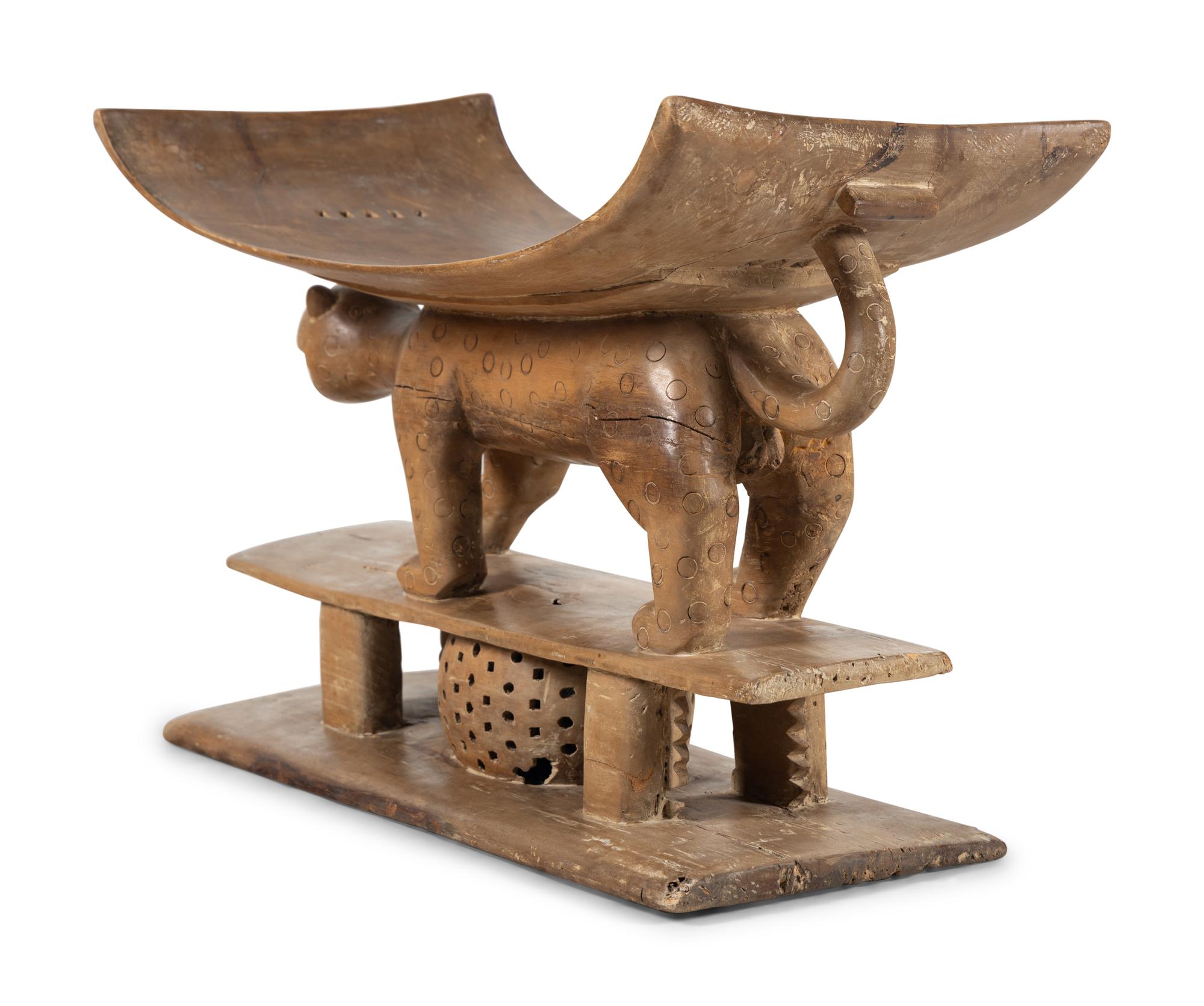 An Asante Carved Wood 'Leopard' Stool