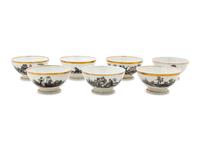 A Collection of Transfer Decorated Cups and Saucers