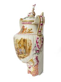 A Continental Polychrome Decorated Parcel Gilt Faience Corner Lavabo and Basin
