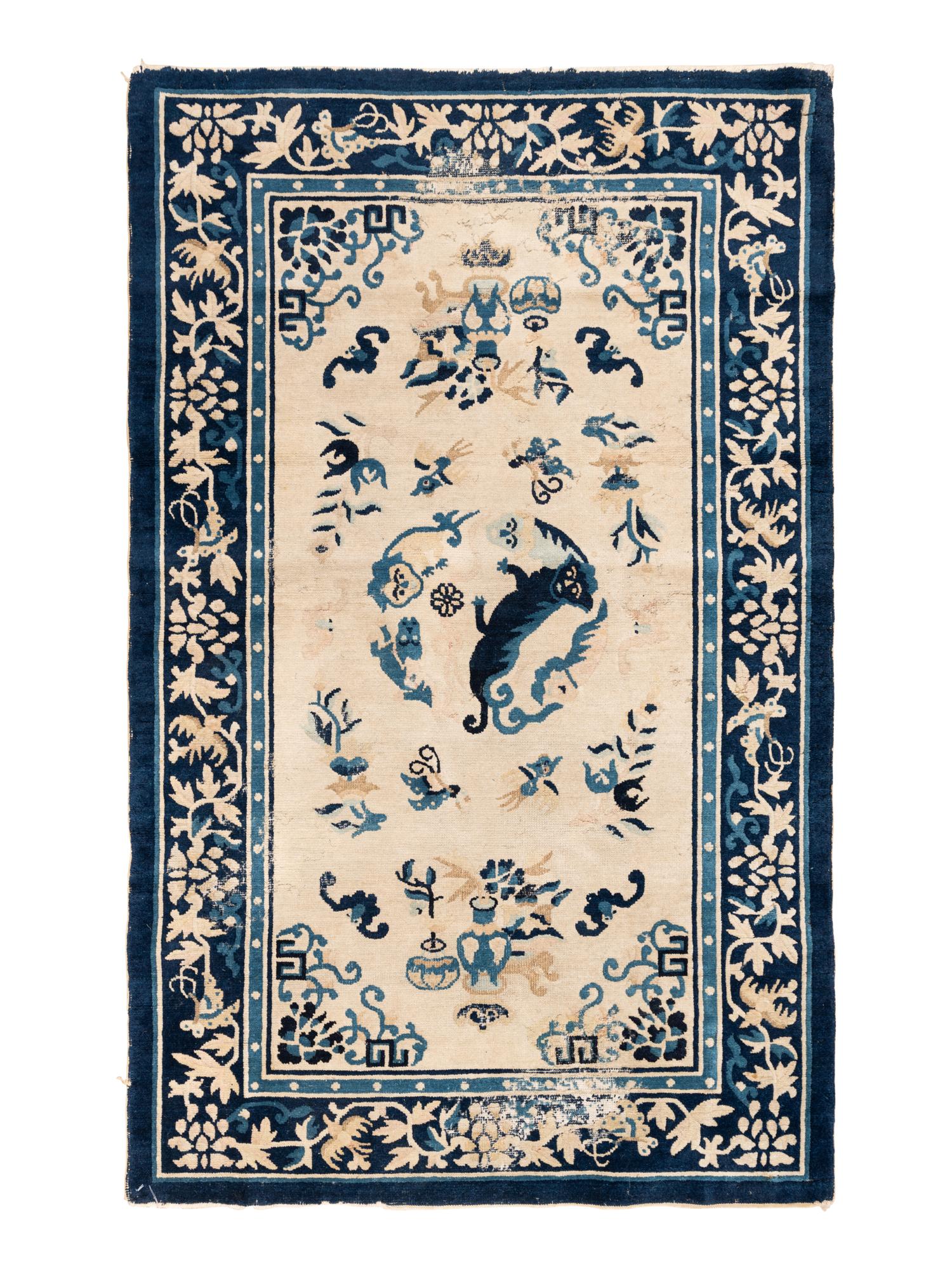 A Chinese Wool Rug with a Buddhistic Lion