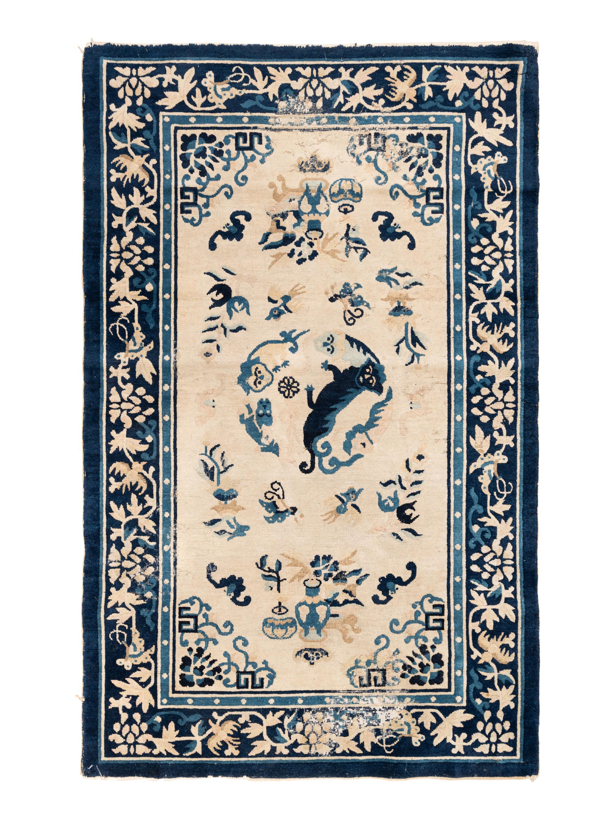 A Chinese Wool Rug with a Buddhistic Lion