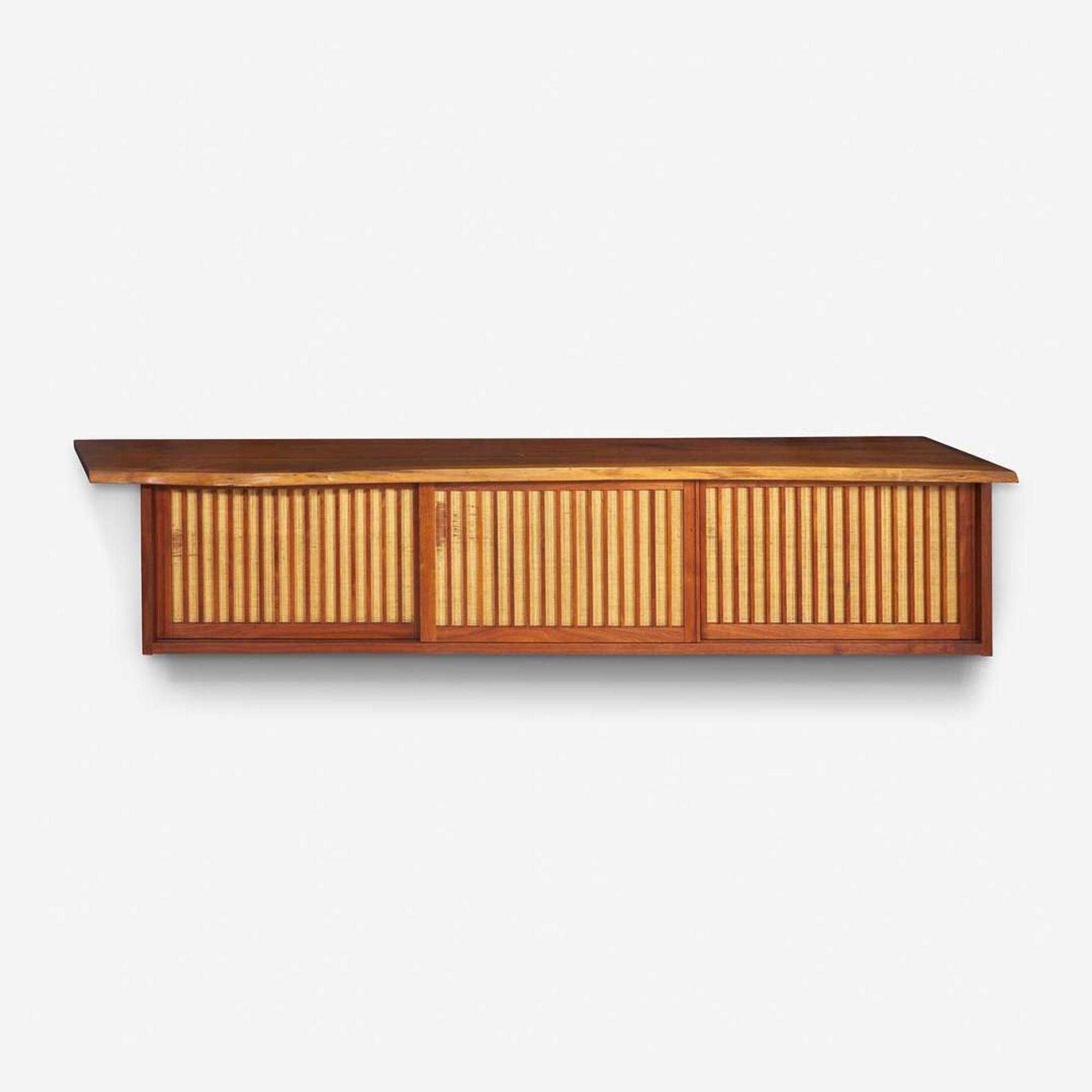 George Nakashima (American, 1905-1990) Triple Sliding-Door Hanging Wall Cabinet, New Hope, Pennsylvania, 1966