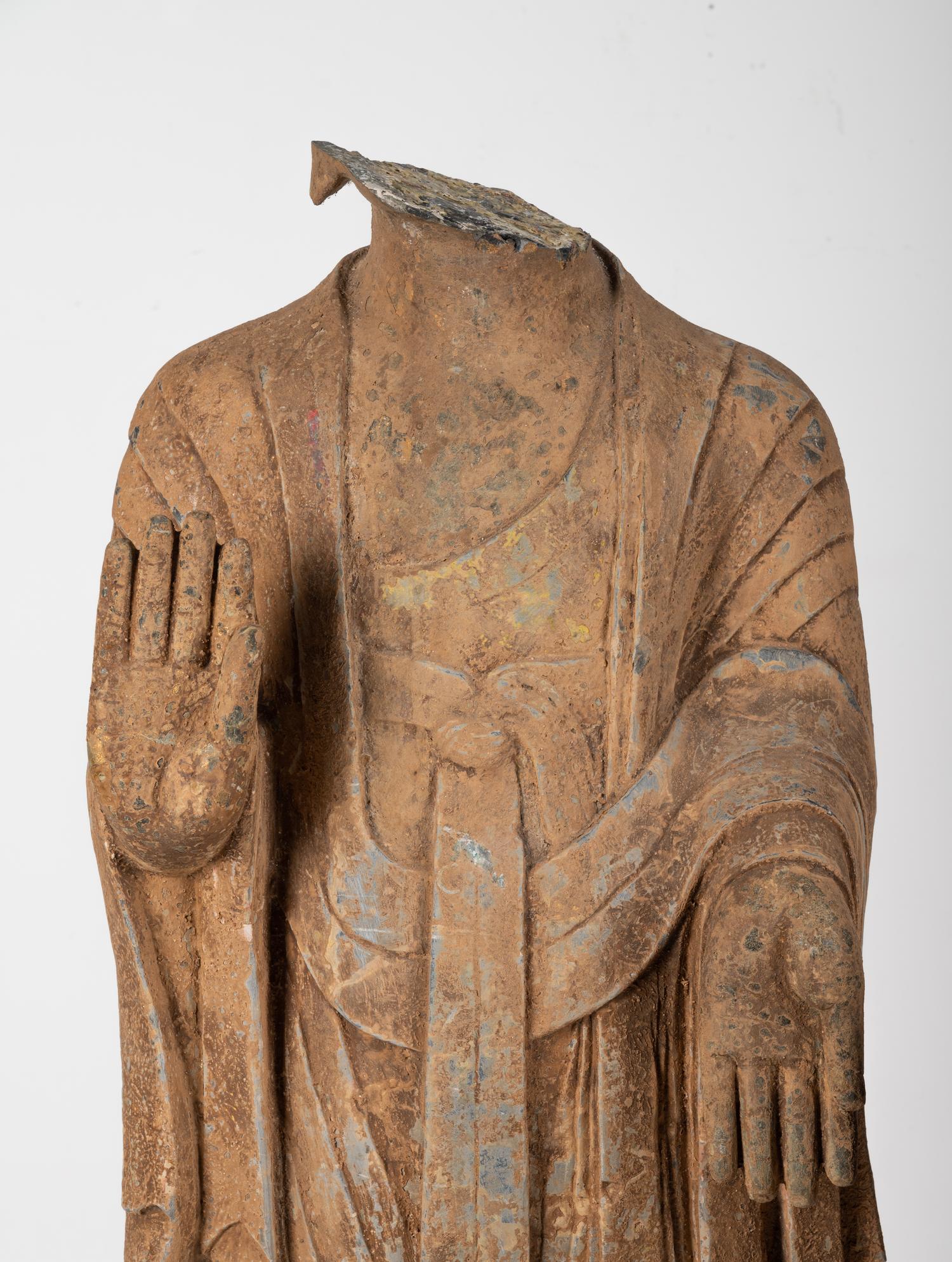 A Chinese Carved Stone Standing Buddha