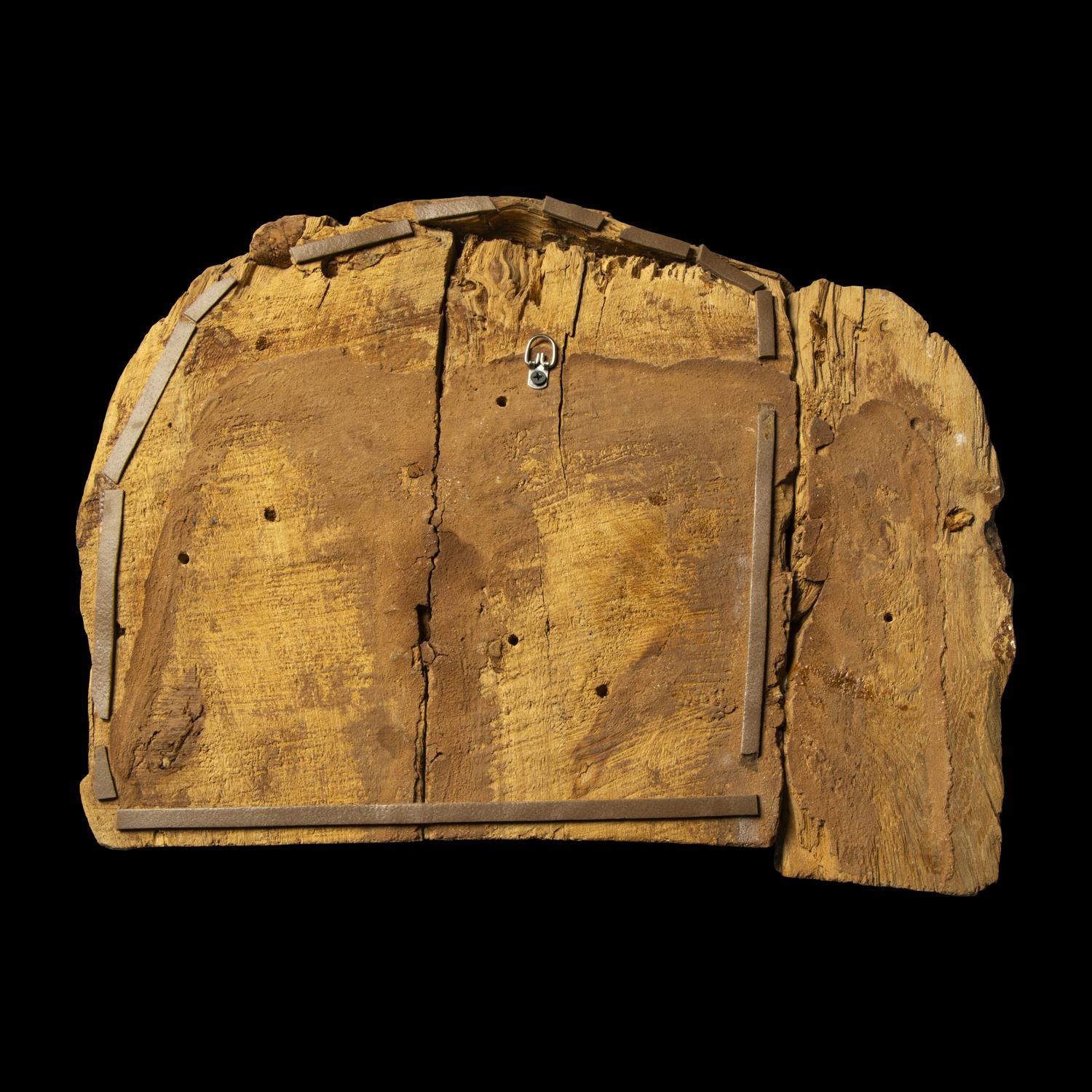 An Egyptian Painted Wood Sarcophagus Head