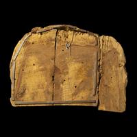 An Egyptian Painted Wood Sarcophagus Head