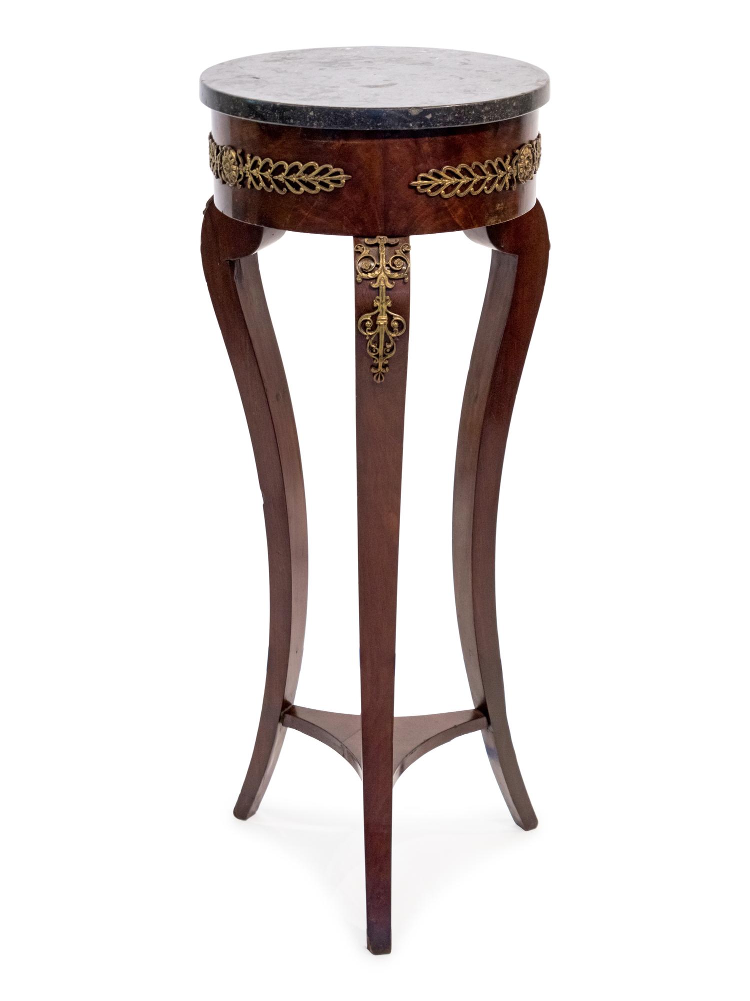 An Empire Style Gilt-Metal-Mounted Mahogany Pedestal