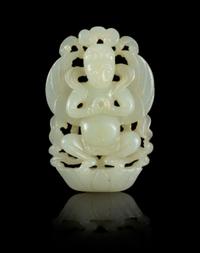 A Carved Jade Pendant Length 2 inches.