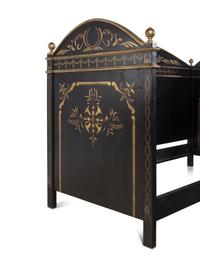 A Pair of Painted and Parcel Gilt Daybeds