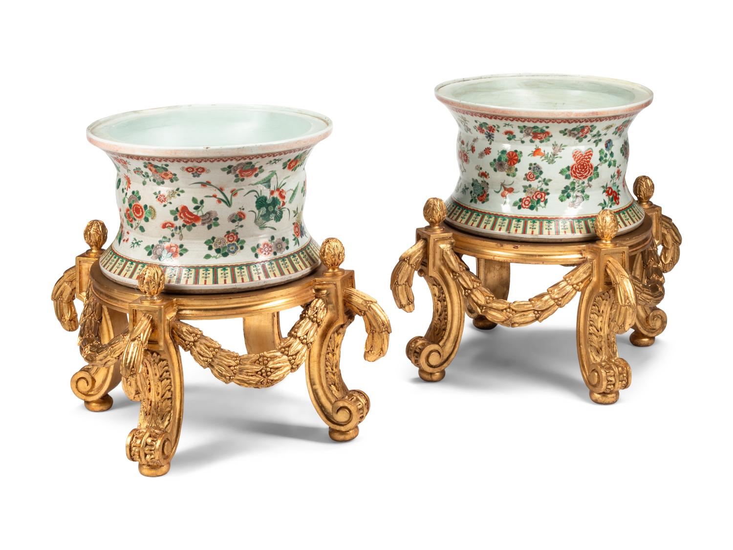 A Pair of Large Chinese Porcelain Jardinières on Giltwood Stands