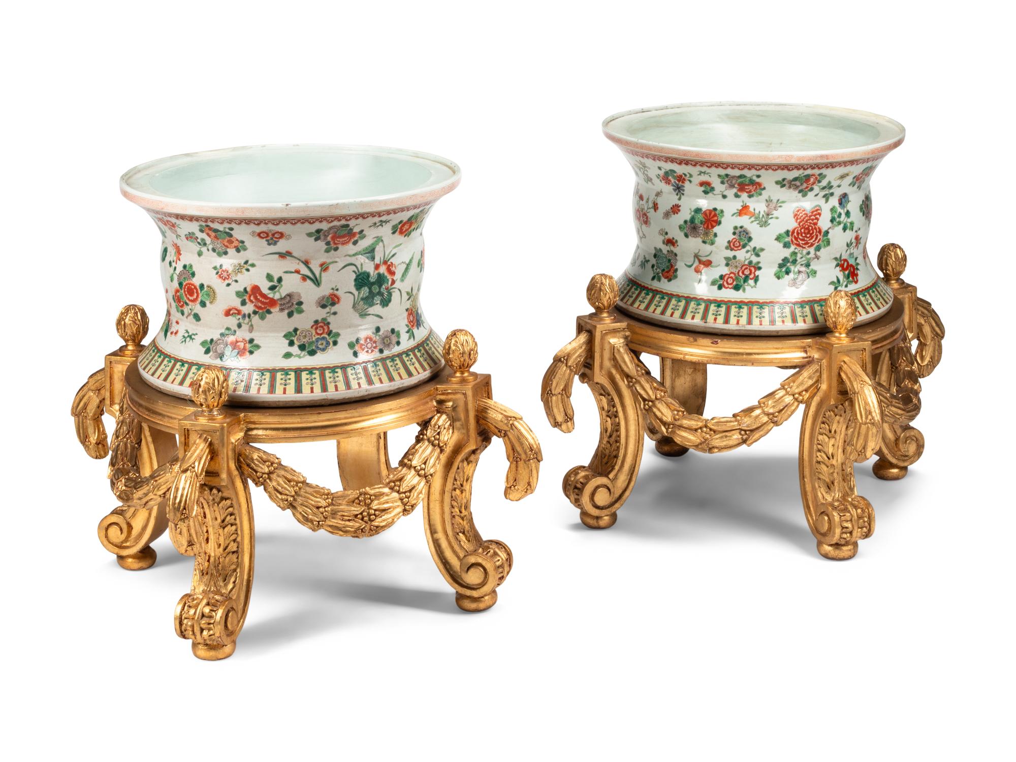 A Pair of Large Chinese Porcelain Jardinières on Giltwood Stands