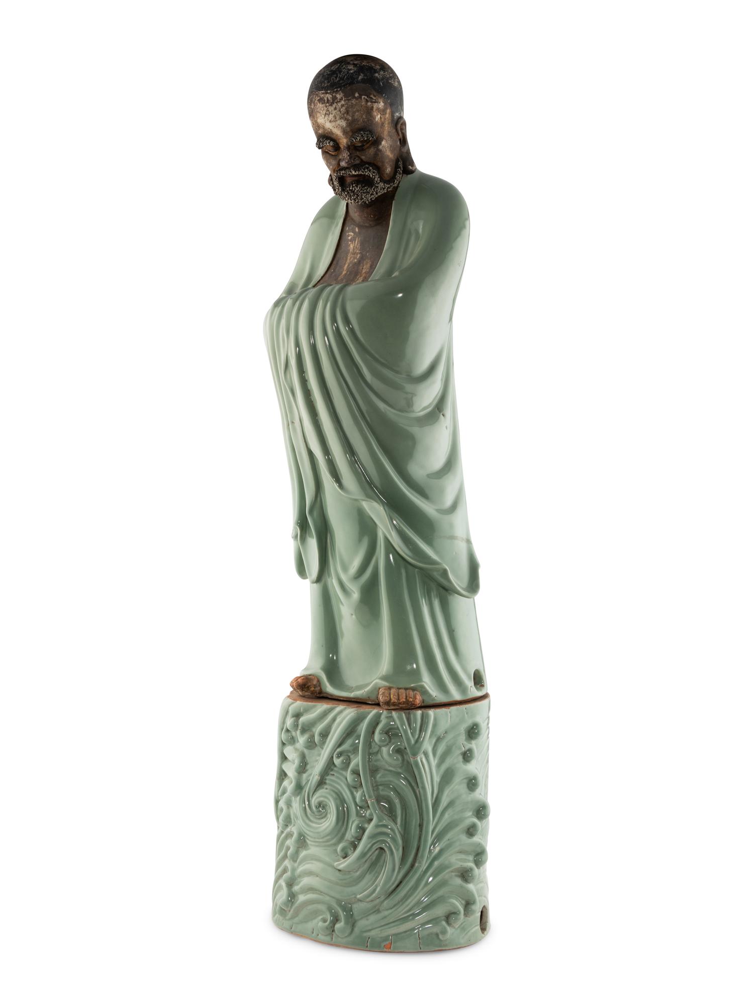 A Large Chinese Celadon Glazed Porcelain Figure of Damo